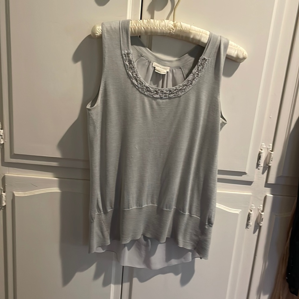 Sleeveless top mix of silk and cotton. The back is sheer silk.  Leroy & perry